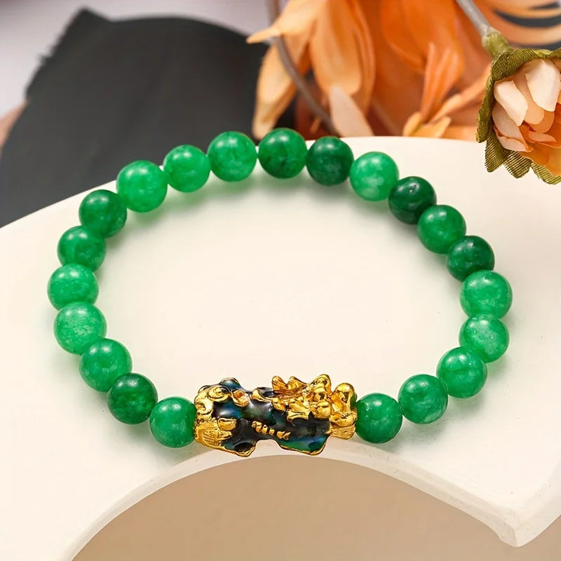 Bracelet amulette de bénédiction de la richesse. Pierre de malachite dorée.
