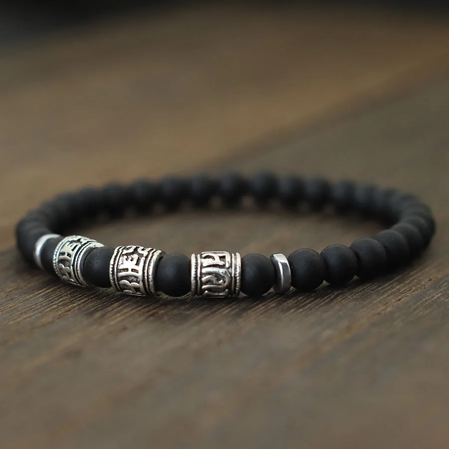 Bracelet vintage perlé en lave naturelle et oeil de tigre. Om Mani Padme Hum Mantra.