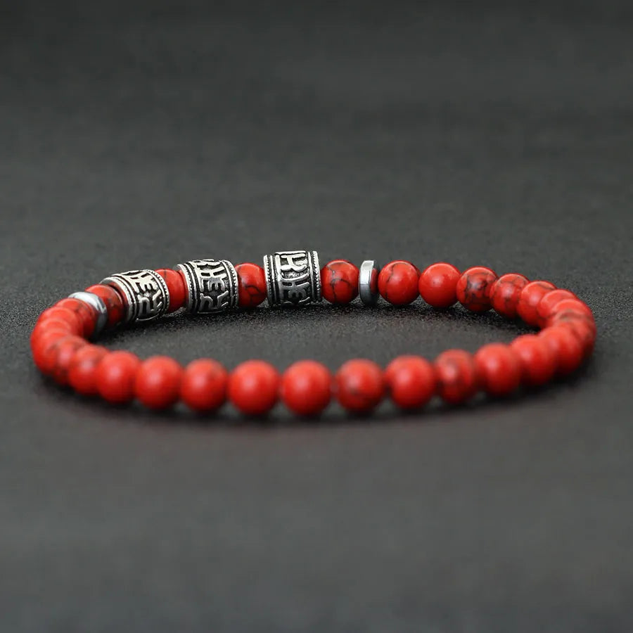 Bracelet vintage perlé en lave naturelle et oeil de tigre. Om Mani Padme Hum Mantra.