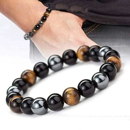 Bracelet de perles "Œil de Tigre" en obsidienne hématite noire. Protection magnétique de la santé.